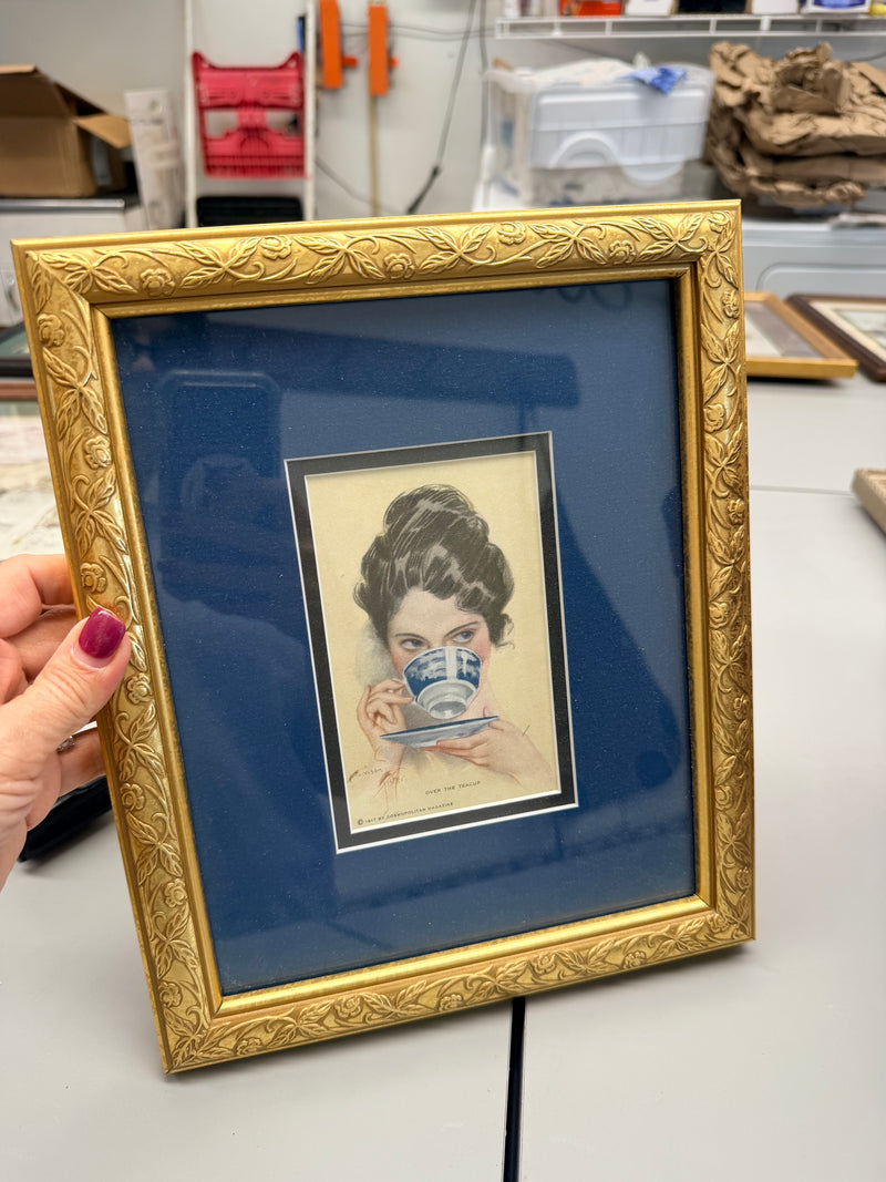Framed Fisher Artwork "Over the Teacup"